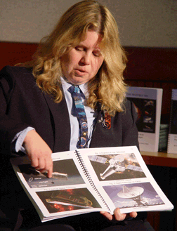Noreen Grice holding a copy of Touch the Invisible Sky