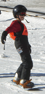 While Vejas was confident he wanted to go snowboarding, and Eric was confident he could, resources such as the blindkid listserv helped him connect with parents that would show him how. Here, Vejas enjoys a snowboarding session�determined and upright.