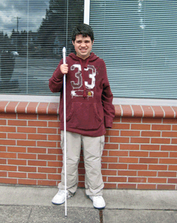 Proper handling of the cane includes holding the cane in an upright position when not in use so as to limit the possibility that someone might trip over an outstretched cane.
