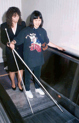 Escalators are always a favorite mode of travel for children of all ages and can be mastered with the use of a cane to determine when to step off.