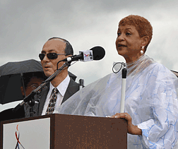 Fred Schroeder listens as Ever Lee Hairston, NFB and civil rights leader, addresses NFB Youth Slam participants from the steps of the Lincoln Memorial during the rally in Washington, DC