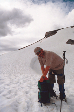 Craig checks his gear in the Canadian Rockies.