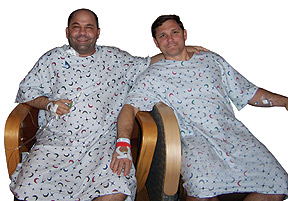 Tom and his brother, Scott, sit together after their surgery.