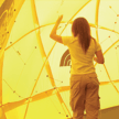Girl exploring tactile atronomy exhibit