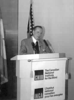 Kenneth Jernigan is pictured responding to the award presentation. (5822 bytes)