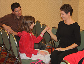 Katie Inman of Florida, who is deaf-blind and her interpreter