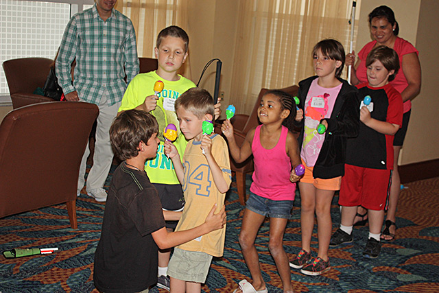 Kids learn salsa dancing at one of Conchita Hernandez's workshops.
