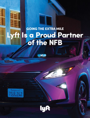 Driver in a car with Lyft logo